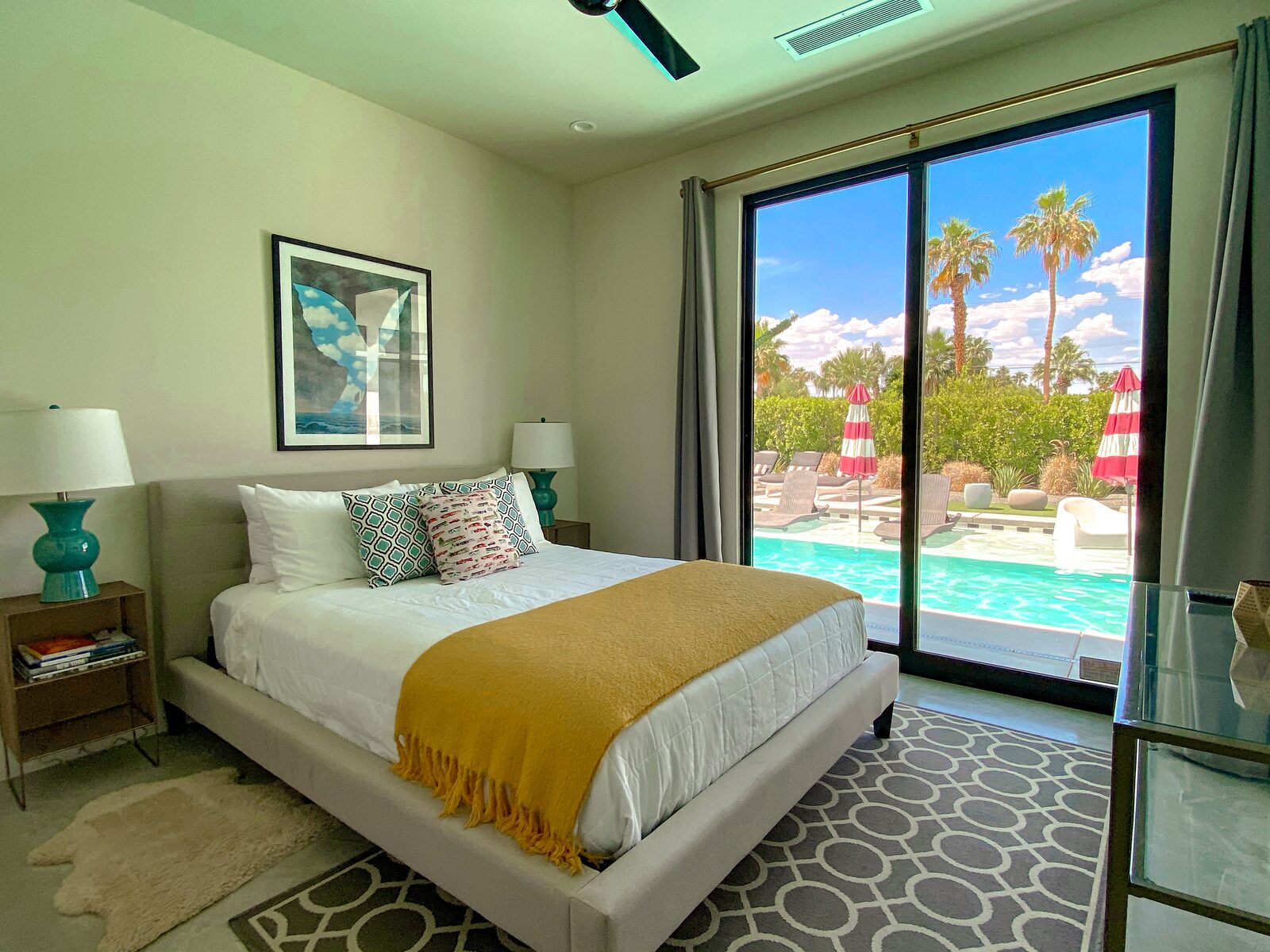 5 Palms Estate guest bedroom with sliding doors to pool