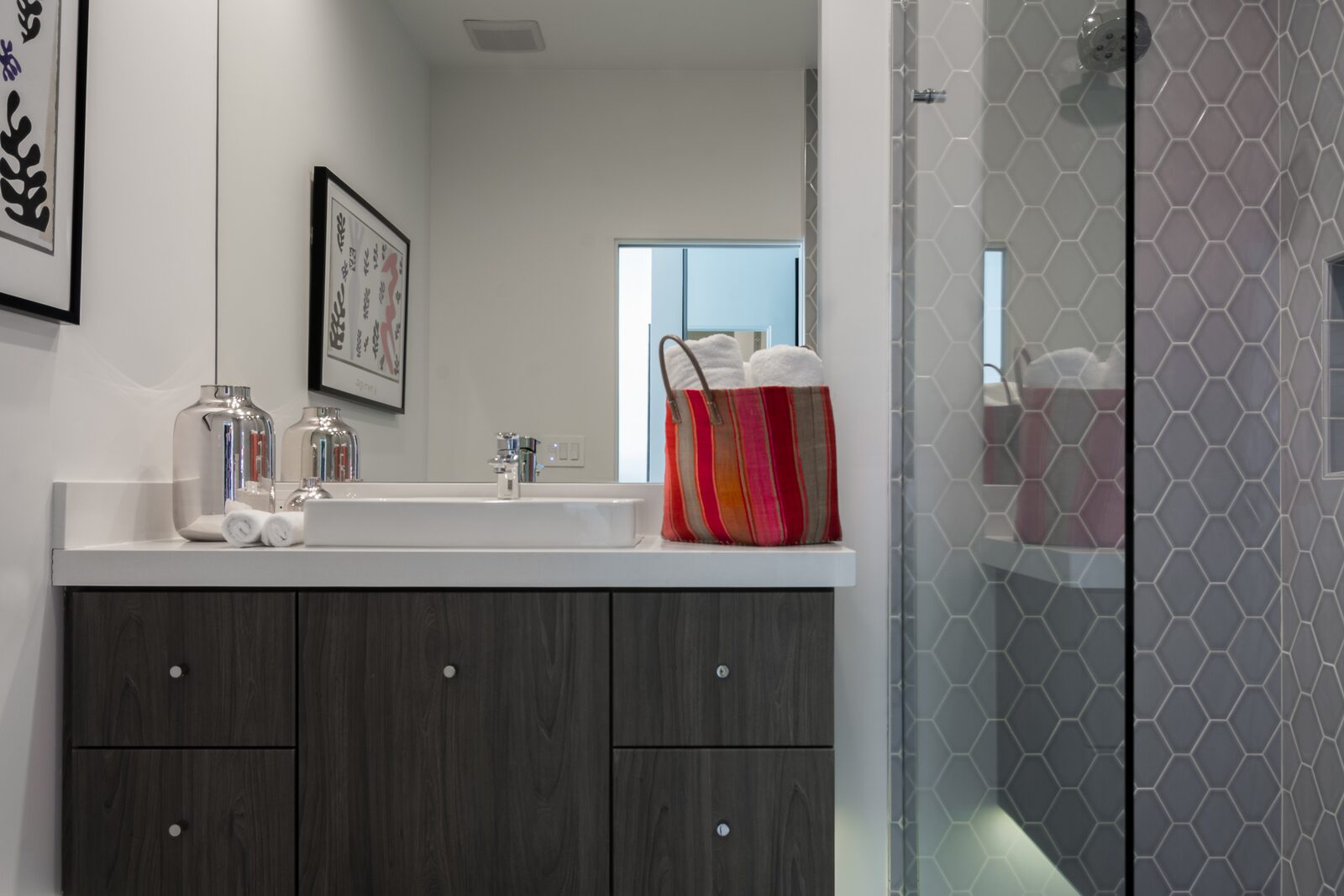 5 Palms Estate en-suite bathroom with shower and coral accent