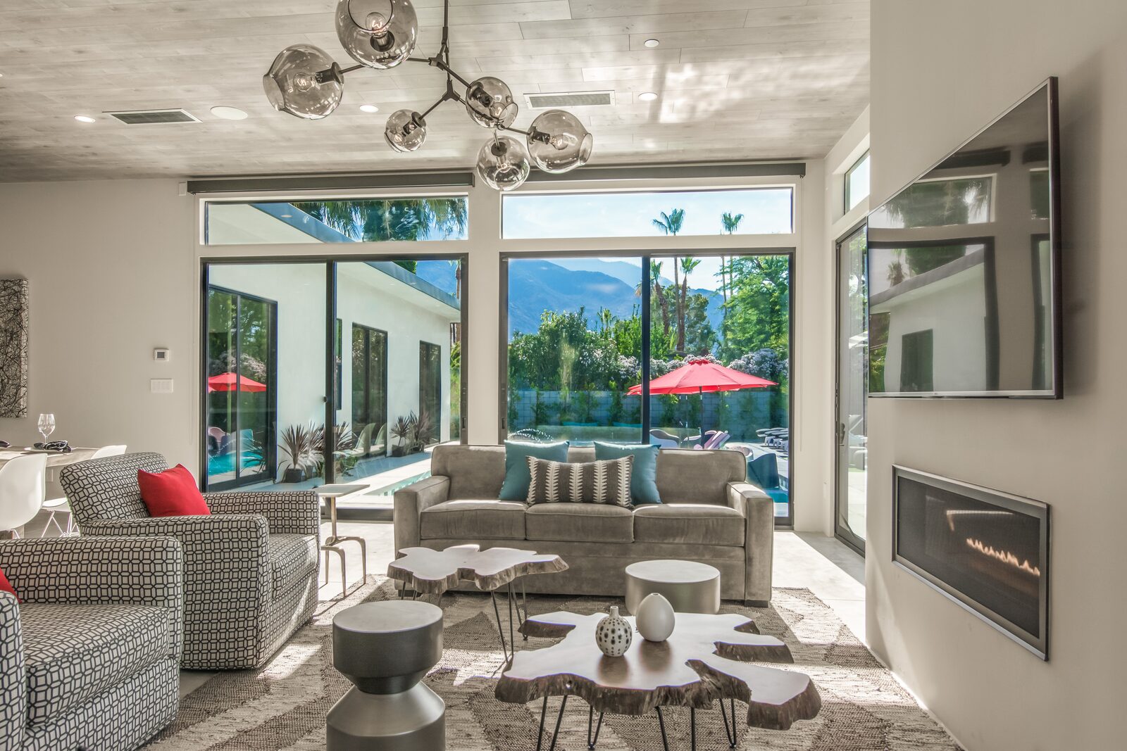 5 Palms Estate 14-foot kitchen island with pendant lights