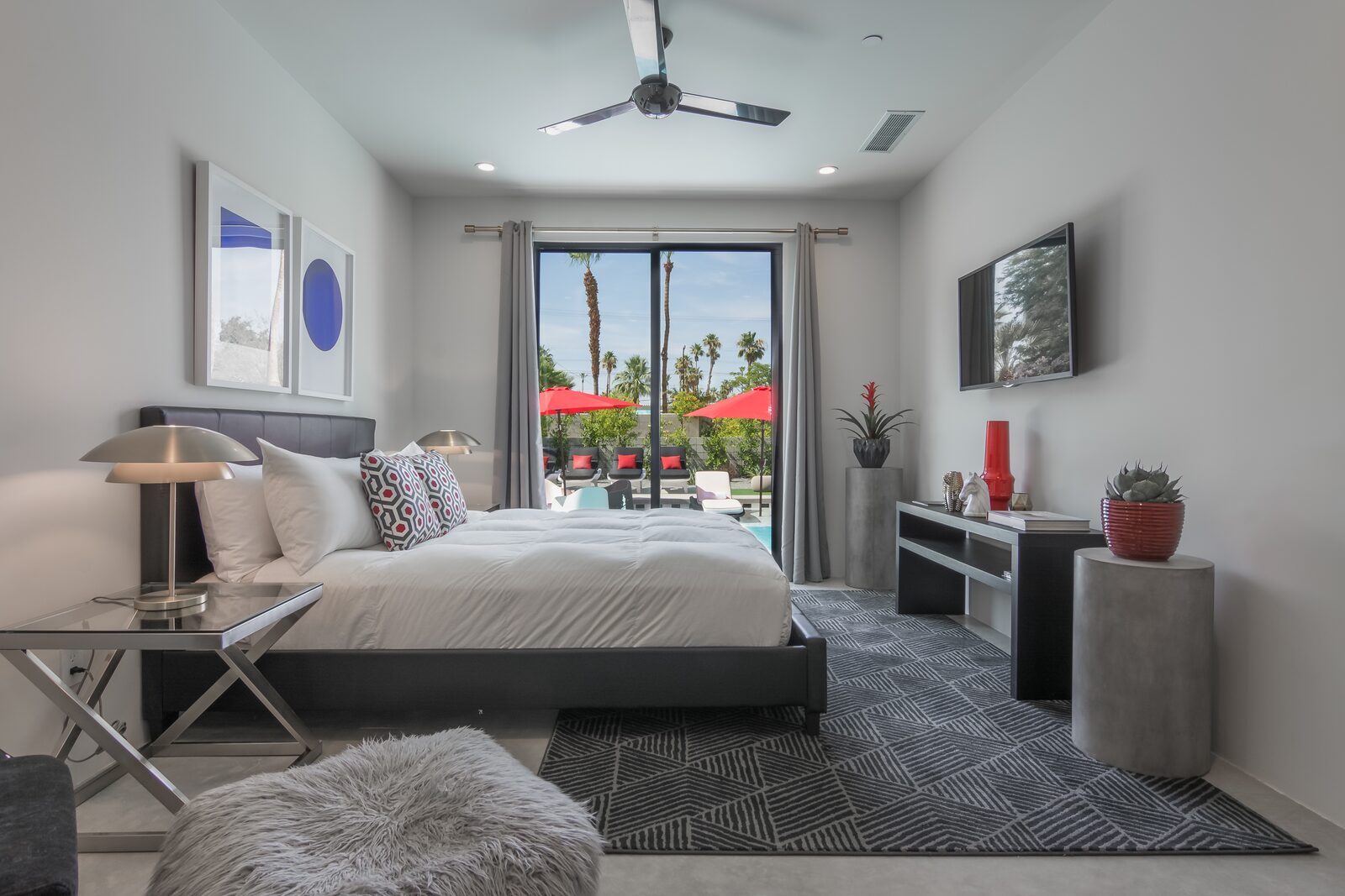 5 Palms Estate bedroom with pool view and modern nightstand