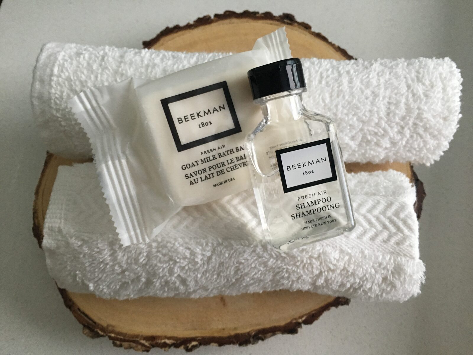 Palms at Park Villa Beekman bath amenity kit on a wooden tray