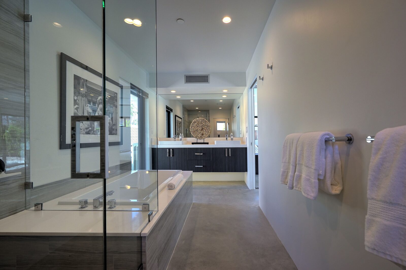 Palms at Park Villa walk-in glass shower with rain fixtures