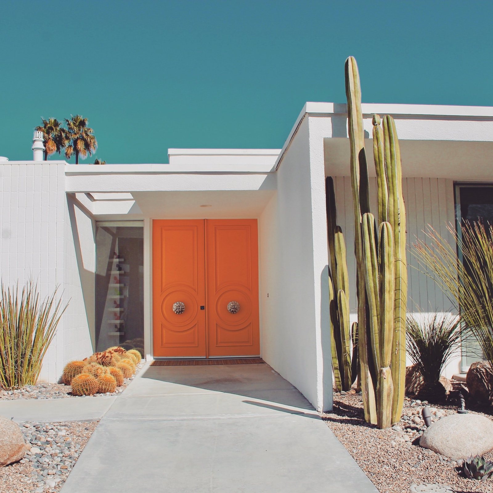 Orange door and desert landscaping in Palm Springs